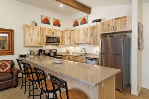 Enjoy a coffee, glass of wine or afternoon snack at the breakfast bar. The fully stocked kitchen meets all your cooking needs!