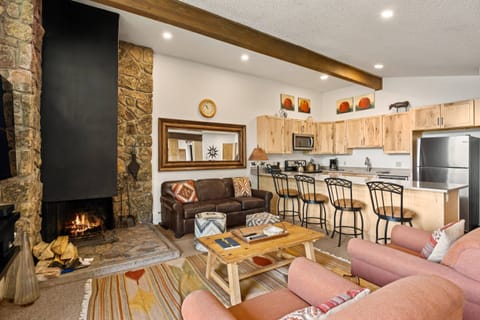 The kitchen is recently remodeled with new appliances, beautiful cabinetry and countertops.