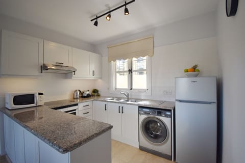 Apartment | Private kitchen | Full-size fridge, microwave, oven, stovetop