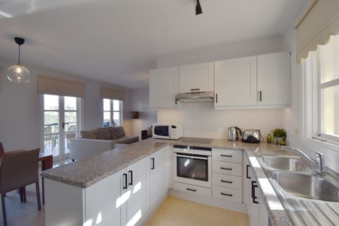 Apartment | Private kitchen | Full-size fridge, microwave, oven, stovetop