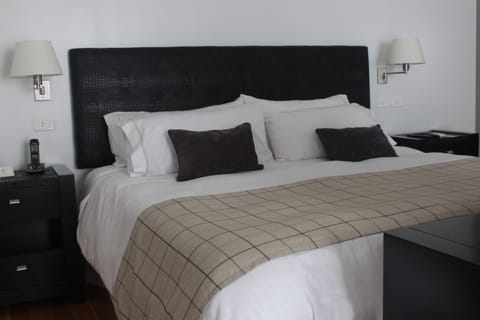 Executive Suite | Egyptian cotton sheets, premium bedding, down comforters, in-room safe