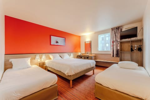 Family Room | Premium bedding, individually furnished, desk, blackout drapes