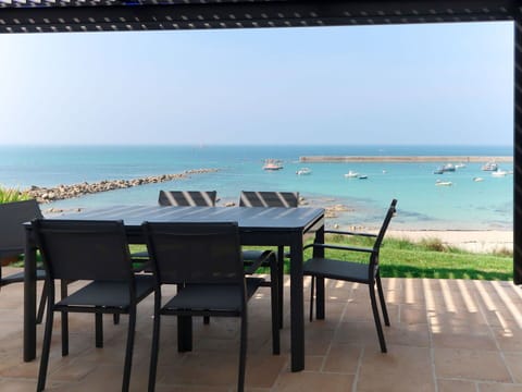 Furniture, Table, Property, Outdoor Table, Room, Outdoor Furniture, Sky, Sea, Ocean, Vacation