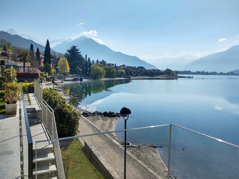 Water, Sky, Cloud, Plant, Water Resources, Mountain, Tree, Highland, Natural Landscape, Lake