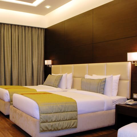 Deluxe Room | Premium bedding, memory foam beds, minibar, individually furnished