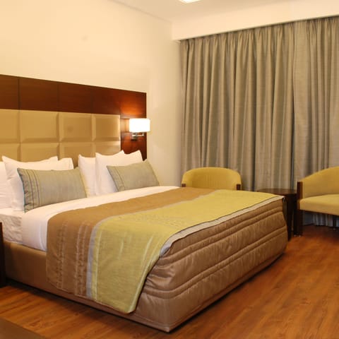 Deluxe Room | Premium bedding, memory foam beds, minibar, individually furnished