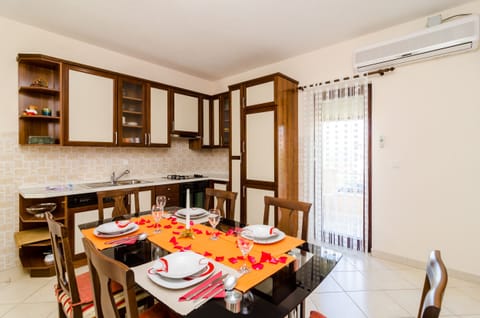 Apartment (Two-Bedroom Apartment with Terrace) | Private kitchen | Fridge, electric kettle