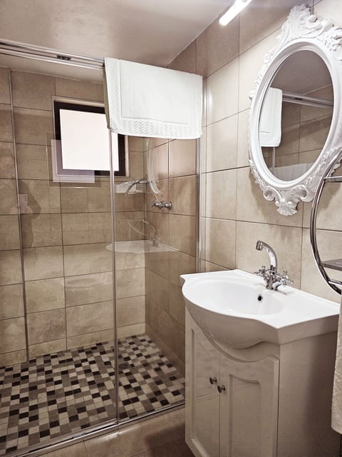 Luxury Single Room no 8 | Bathroom | Separate tub and shower, deep soaking tub, rainfall showerhead