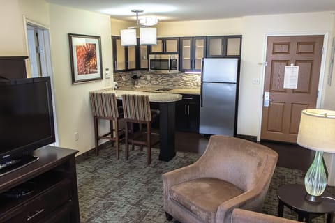 Suite, 2 Bedrooms | Private kitchen | Full-size fridge, microwave, stovetop, dishwasher