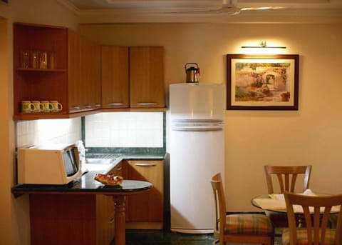 One Bed Room Suite | Private kitchenette | Fridge, microwave, electric kettle