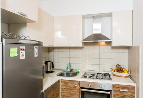 Apartment (Two Bedroom Apartment with Balcony) | Private kitchen | Fridge, oven, electric kettle, freezer