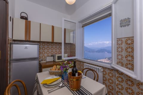 Family Apartment, Multiple Bedrooms, Mountainside (Nicoletta's Lake View Stresa) | Private kitchen | Full-size fridge, microwave, oven, stovetop