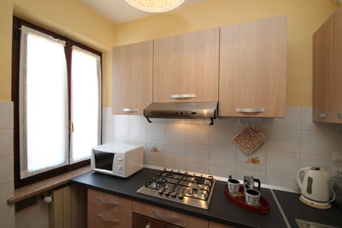 Family Apartment, 1 Bedroom (Sunset in Baveno) | Private kitchen | Full-size fridge, microwave, oven, stovetop