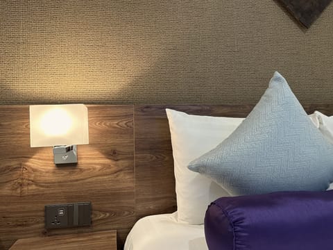 Economy Double Room, No Windows | Minibar, in-room safe, desk, laptop workspace