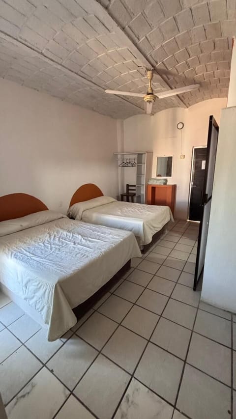 Deluxe Room, Kitchenette | Iron/ironing board, free WiFi, bed sheets