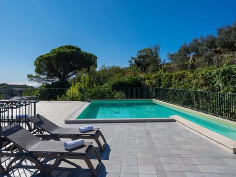 Water, Sky, Furniture, Building, Plant, Swimming Pool, Chair, Azure, Shade, Outdoor Furniture