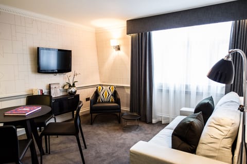 Suite | Living area | Flat-screen TV, pay movies