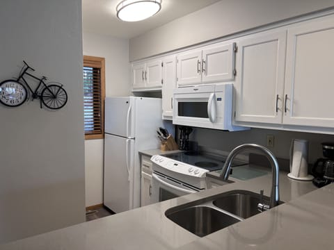 Condo | Private kitchen | Mini-fridge, microwave, coffee/tea maker