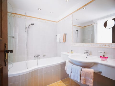 Combined shower/tub, free toiletries, hair dryer, bathrobes