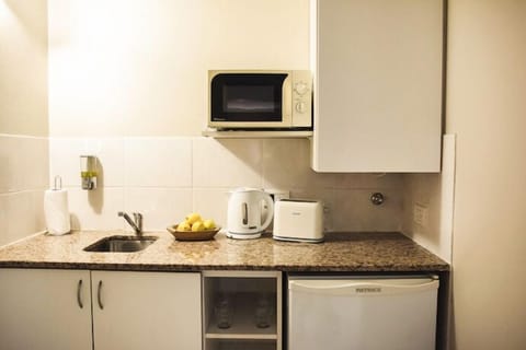 Suite | Private kitchen | Fridge, microwave, cookware/dishes/utensils