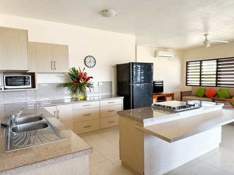 Pool View Two-Bedroom Apartment | Private kitchen | Full-size fridge, coffee/tea maker, electric kettle, toaster