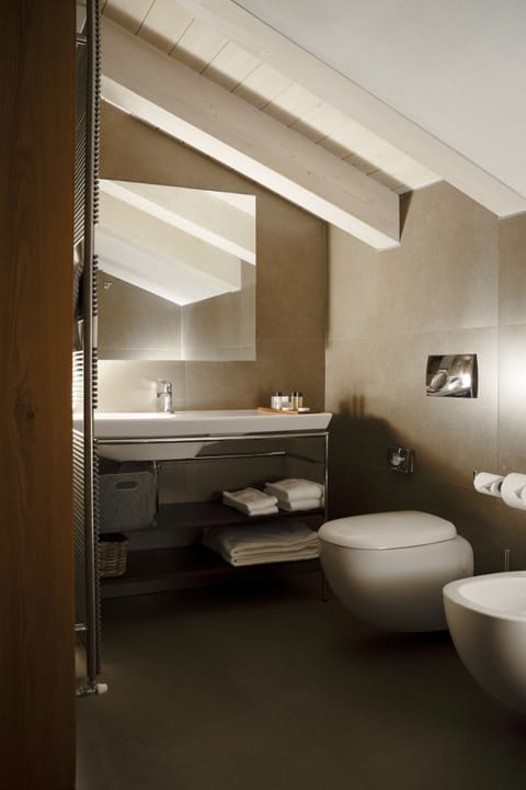 Design Duplex | Bathroom | Hair dryer, bathrobes, slippers, towels