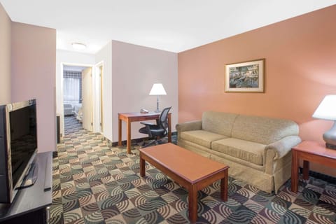 Suite, 1 Bedroom | Desk, iron/ironing board, free cribs/infant beds, rollaway beds