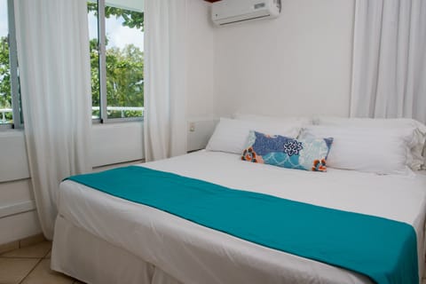 Apartment, 1 Bedroom, Ocean View | Egyptian cotton sheets, premium bedding, minibar, desk