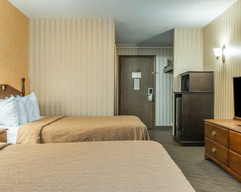 Standard Room, 2 Queen Beds, Non Smoking | In-room safe, desk, laptop workspace, iron/ironing board