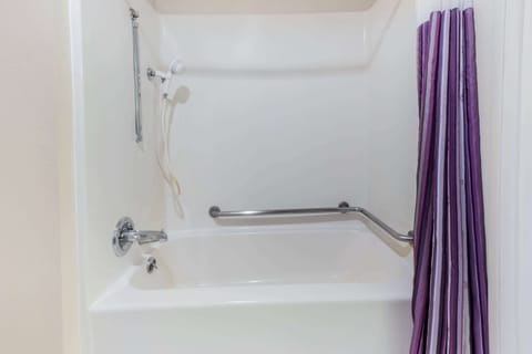 Combined shower/tub, designer toiletries, hair dryer, bathrobes