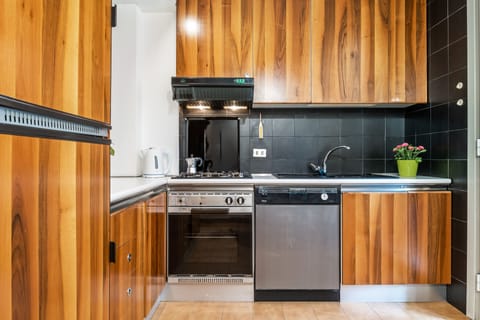 Apartment, 1 Bedroom | Private kitchen | Full-size fridge, oven, stovetop, dishwasher