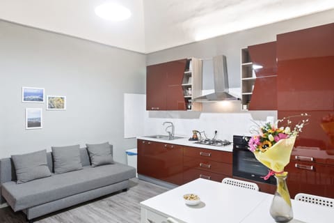 Apartment, 1 Bedroom | Living area | Flat-screen TV