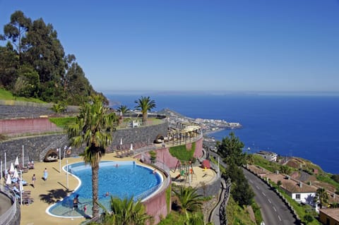 Indoor pool, outdoor pool, pool umbrellas, sun loungers