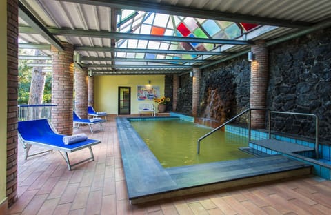 Indoor pool, outdoor pool, pool umbrellas, sun loungers