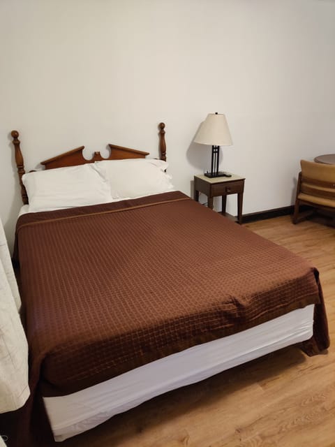 Standard Single Room, 1 Queen Bed, Accessible | Blackout drapes, iron/ironing board, free WiFi, bed sheets