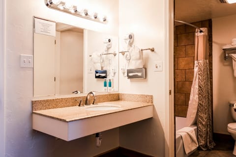 Standard Room, 2 Queen Beds | Bathroom | Combined shower/tub, eco-friendly toiletries, hair dryer, towels