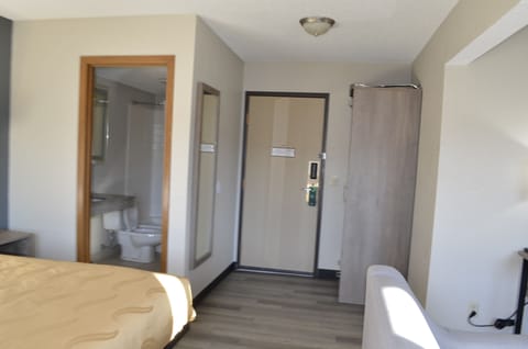 Suite, 1 King Bed with Sofa bed, Non Smoking | Bathroom | Free toiletries, hair dryer, towels, soap