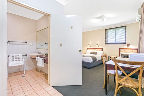 Room, Multiple Beds, Accessible, Non Smoking | Bathroom | Shower, hair dryer, towels, soap