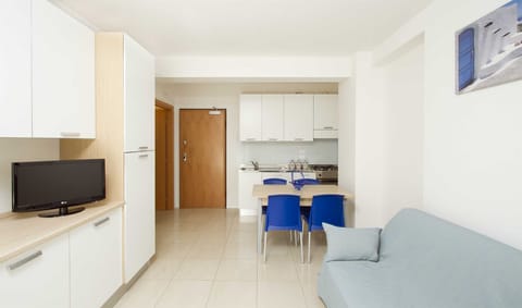 Classic Apartment, 1 Bedroom | Living room | Flat-screen TV