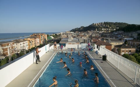 Outdoor pool, open 10:00 AM to 6:00 PM, sun loungers