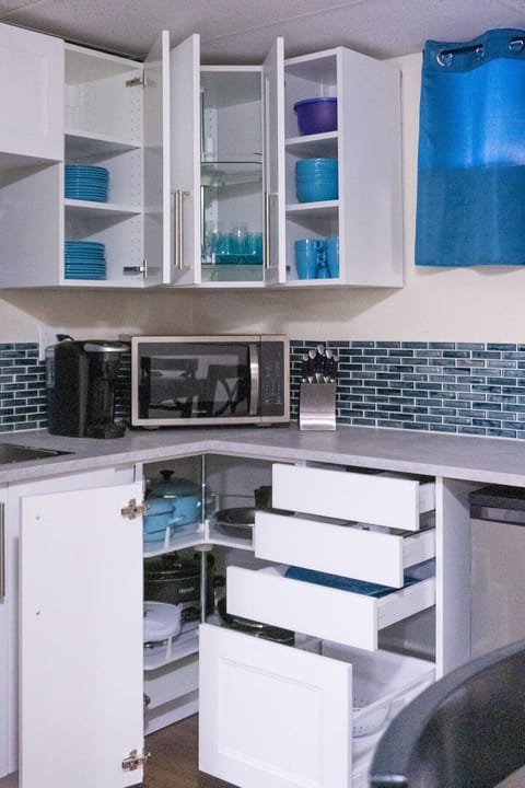 Microwave, Keurig, blender, crock pot, rice cooker, waffle maker, pots and pans