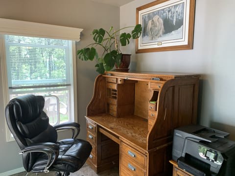 Office/workspace. Located in the master bedroom. Wifi printing available