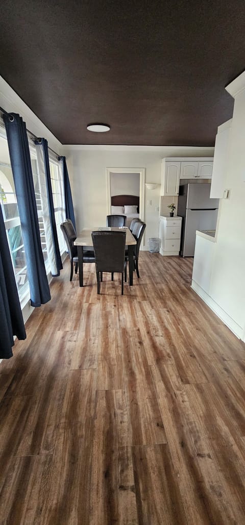 Two-Bedroom Family Suite with Kitchen | Private kitchen | Microwave, coffee/tea maker