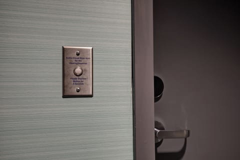 Hypo-allergenic bedding, desk, laptop workspace, blackout drapes