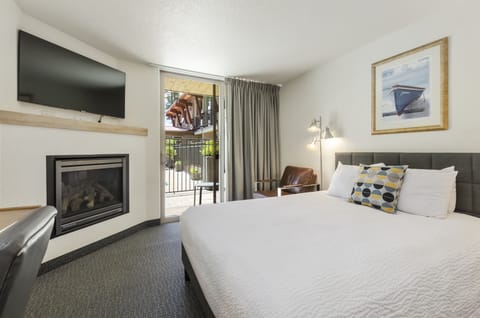 Signature Double Room, Fireplace, Poolside | Desk, laptop workspace, blackout drapes, soundproofing