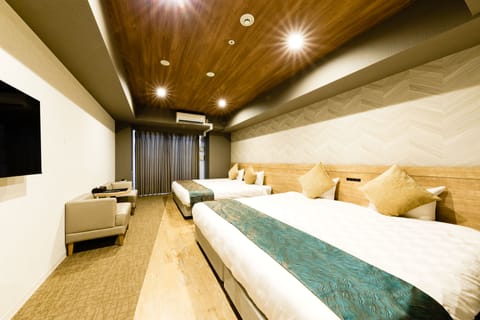 Deluxe Twin Room, Non Smoking | Premium bedding, down comforters, memory foam beds, in-room safe