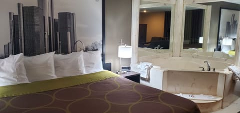 Deluxe Studio Suite, 1 King Bed, Non Smoking | In-room safe, desk, laptop workspace, blackout drapes