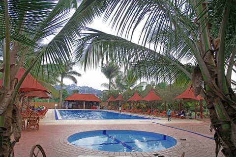 2 outdoor pools, open 7:00 AM to 7:00 PM, free cabanas, sun loungers