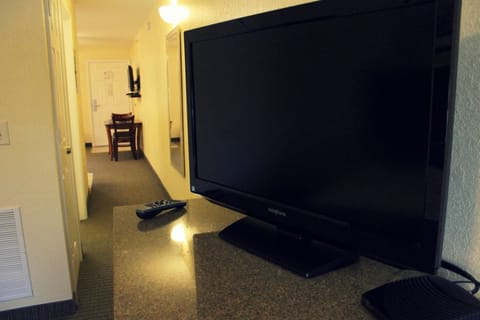 40-inch flat-screen TV with cable channels, TV