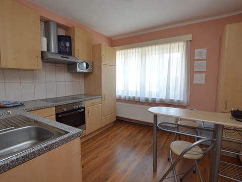 Apartment | Private kitchen | Coffee/tea maker, highchair